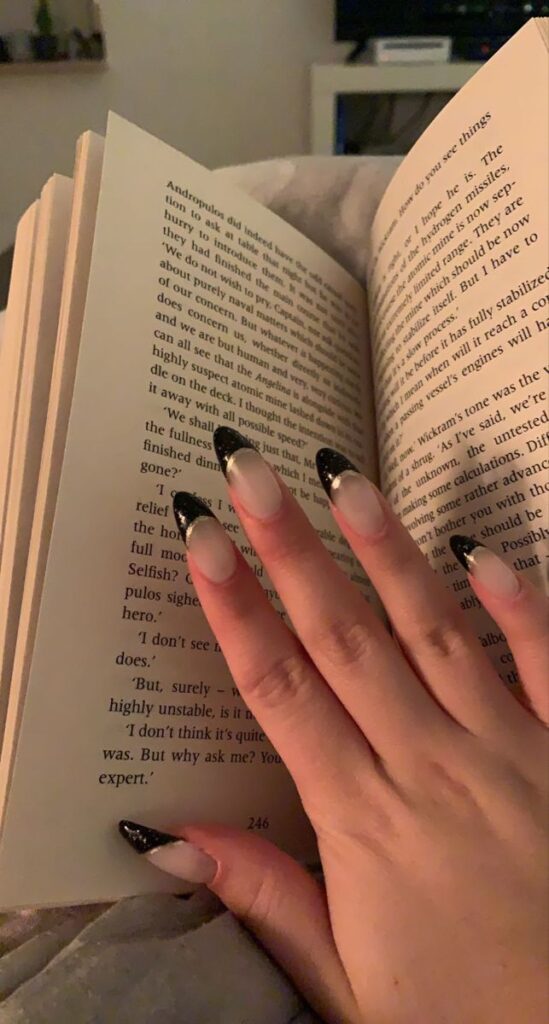 Almond Nails with Black French Tips = Femme Fatale